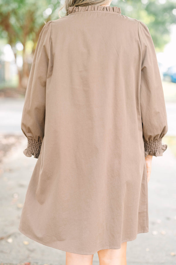 Plus size dress with smock detail, functional buttons down front and smocked long sleeves