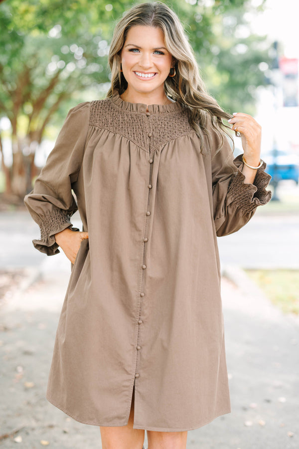 Plus size dress with smock detail, functional buttons down front and smocked long sleeves