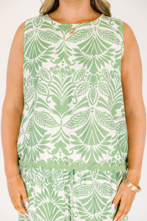 Plus Size sleeveless green tropical floral print top with a scalloped ric rac hem.