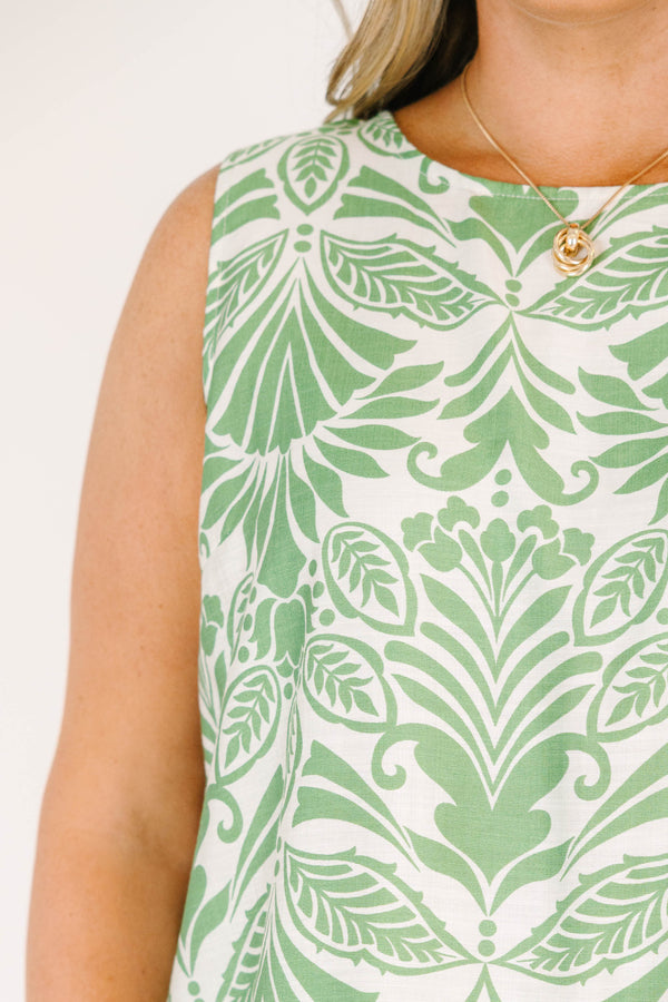Plus Size sleeveless green tropical floral print top with a scalloped ric rac hem.