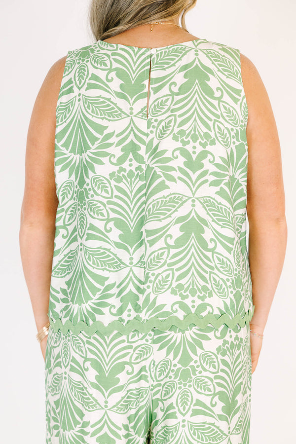 Plus Size sleeveless green tropical floral print top with a scalloped ric rac hem.