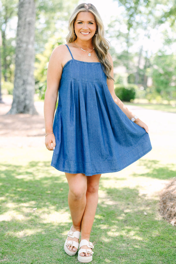 Plus Size denim mini dress with thin spaghetti straps, a square neckline, and a pleated skirt.