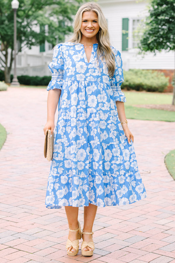 Plus Size blue and white floral tiered midi dress with puff sleeves and a V-neckline.