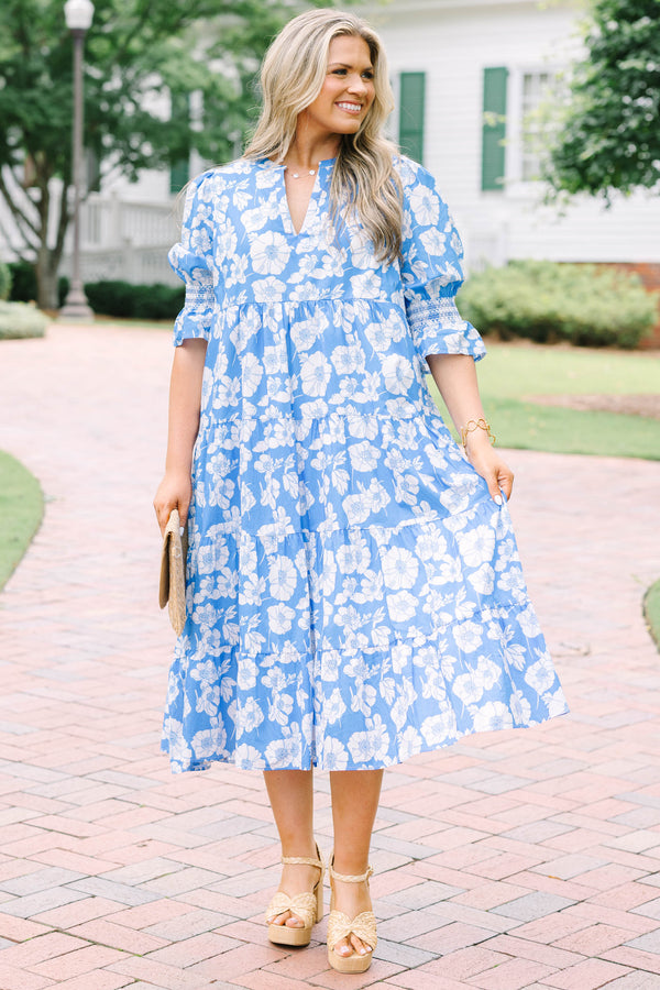 Plus Size blue and white floral tiered midi dress with puff sleeves and a V-neckline.