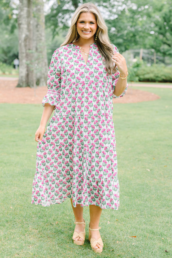 Plus Size pink floral tiered midi dress with puff sleeves and a V-neckline.