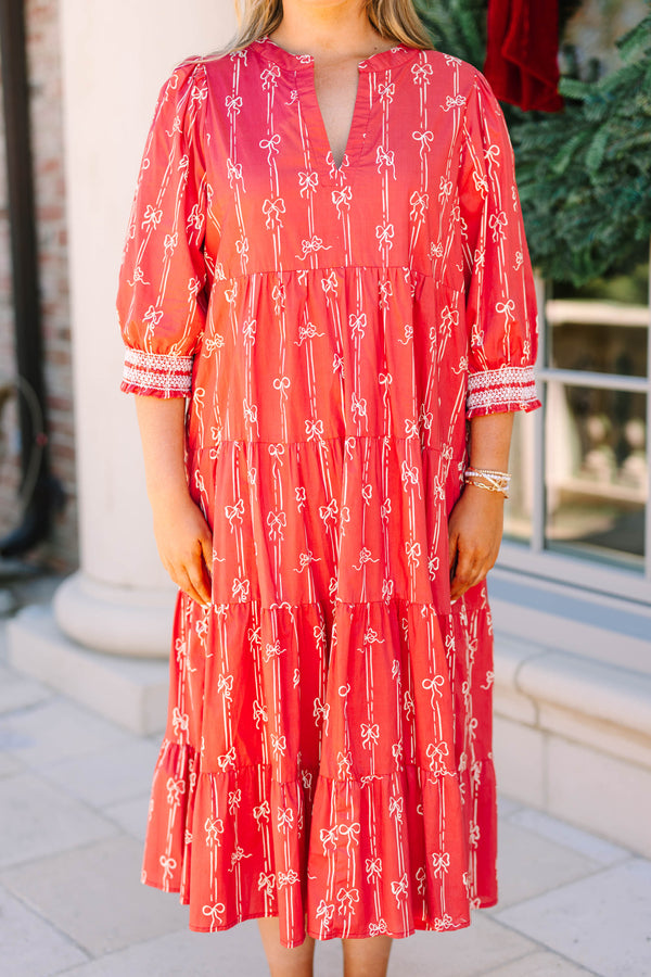 Plus size red bow print midi dress with a tiered skirt, v-neckline, and flowy cotton fit.