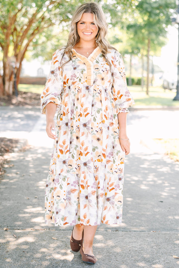 Plus Size cream floral midi dress with a ruffled V-neckline and tiered skirt in 100% cotton.