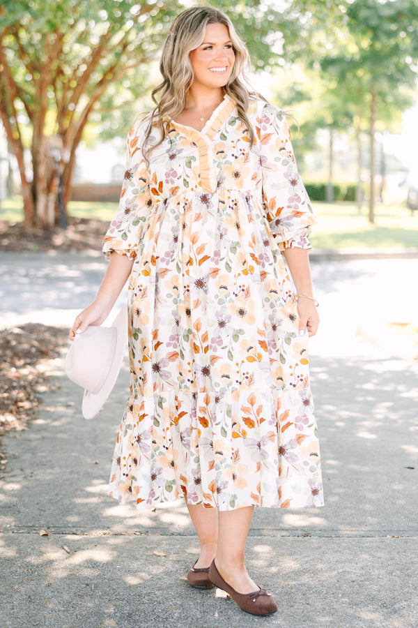 Plus Size cream floral midi dress with a ruffled V-neckline and tiered skirt in 100% cotton.