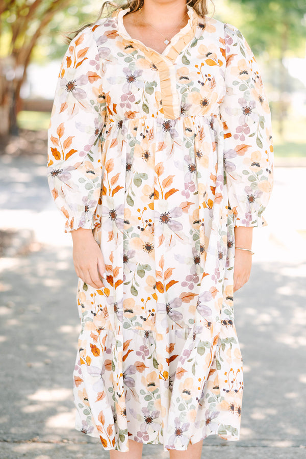 Plus Size cream floral midi dress with a ruffled V-neckline and tiered skirt in 100% cotton.