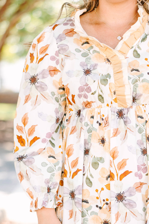 Plus Size cream floral midi dress with a ruffled V-neckline and tiered skirt in 100% cotton.