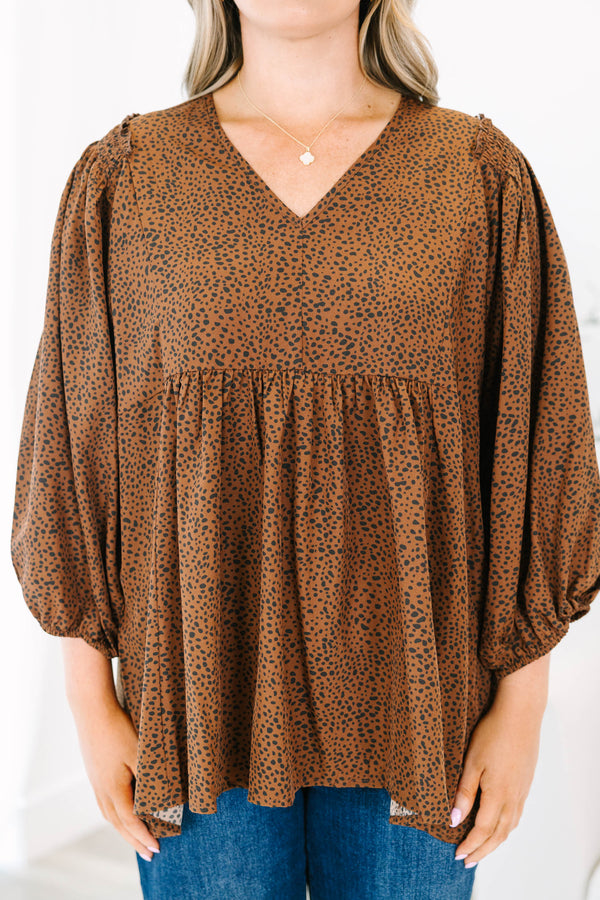 Chic Soul plus size clothing, brown long sleeve flowy top with a slight v-neckline and a small black polka dot pattern 