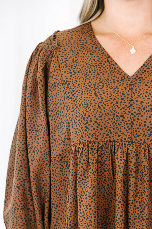 Chic Soul plus size clothing, brown long sleeve flowy top with a slight v-neckline and a small black polka dot pattern 