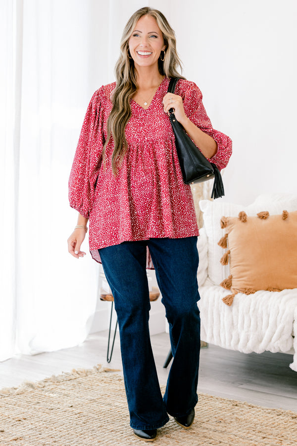 Chic Soul plus size clothing, red long sleeve babydoll top with a slight v-neckline and a white polka dot pattern throughout