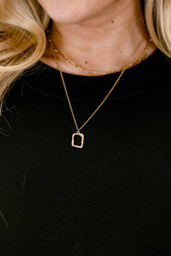 Chic Soul plus size clothing, gold necklace with a gold metal square pendent attached to a gold link chain 