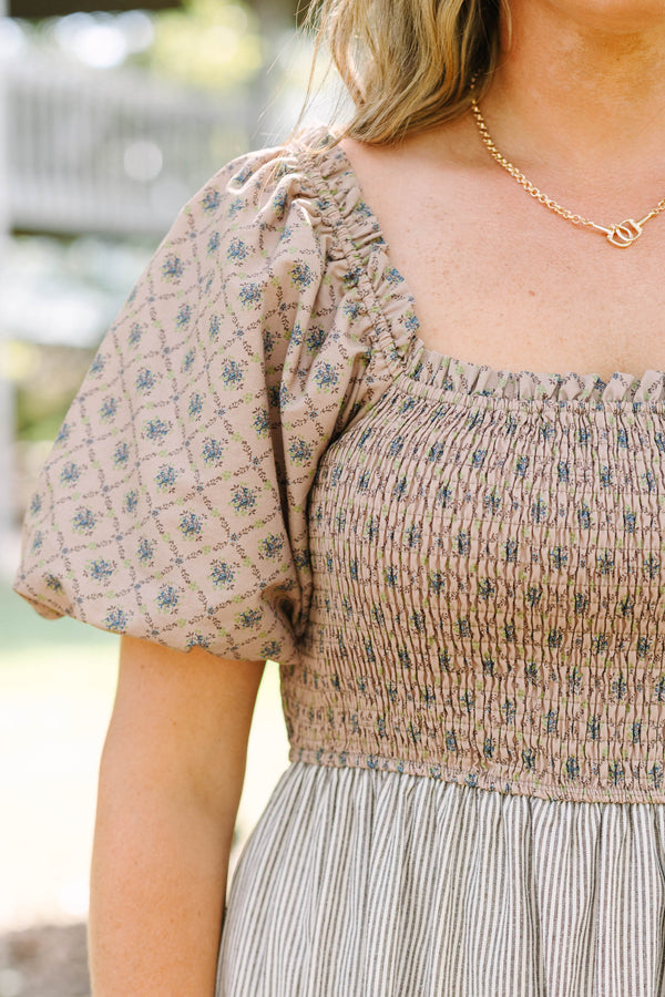 Plus Size cream tiered maxi dress with smocked bodice, puff sleeves, and mixed floral-stripe prints.