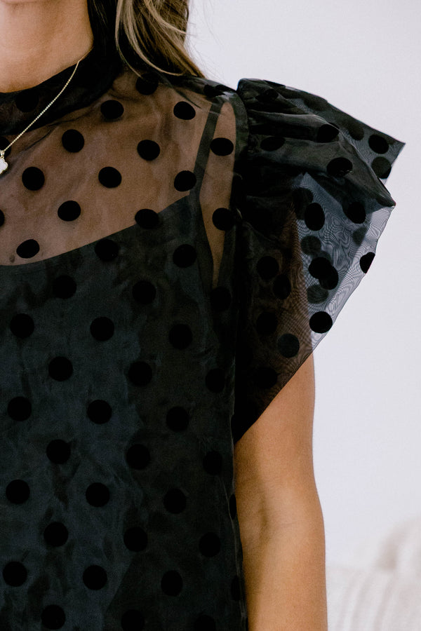Chic Soul plus size clothing, black top with a sheer polka dot overlay that has flutter sleeves 