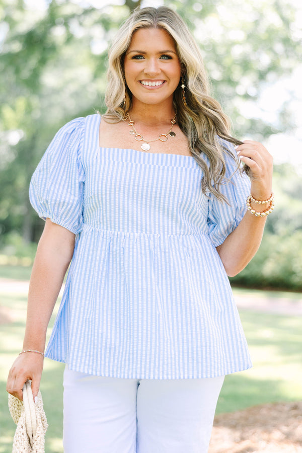 Plus Size blue and white striped seersucker top with puff sleeves and a square neckline.