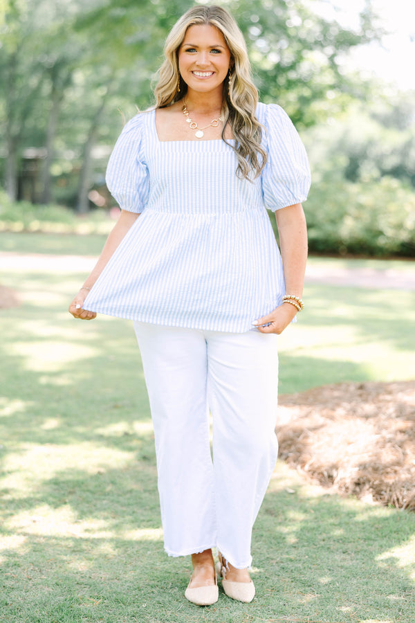 Plus Size blue and white striped seersucker top with puff sleeves and a square neckline.