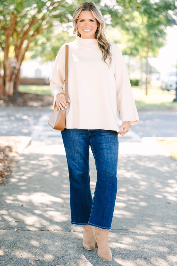 Plus Size taupe mock neck sweater with long wide sleeves and a relaxed fit.