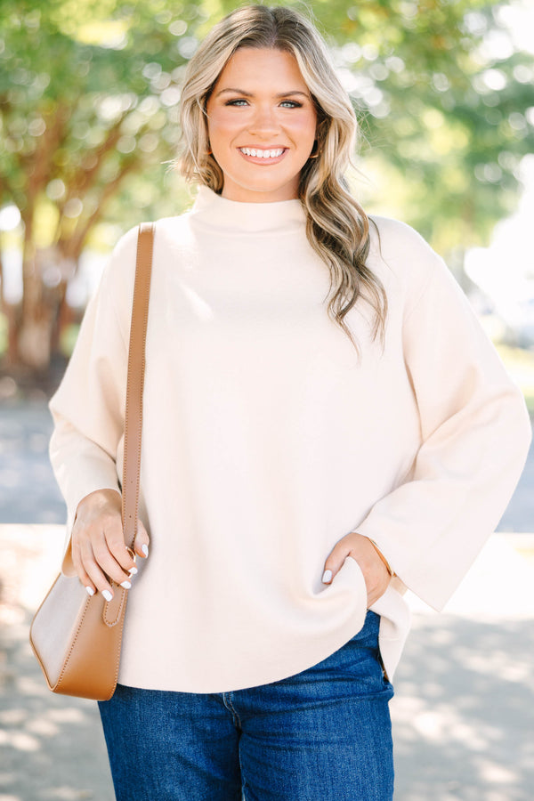Plus Size taupe mock neck sweater with long wide sleeves and a relaxed fit.
