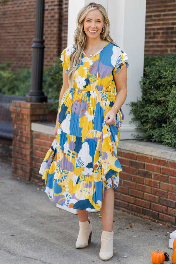 Chic Soul plus size clothing, mustard short sleeve midi dress with tiered detail with large floral print with v neckline with tie detail with ruffle along sleeves