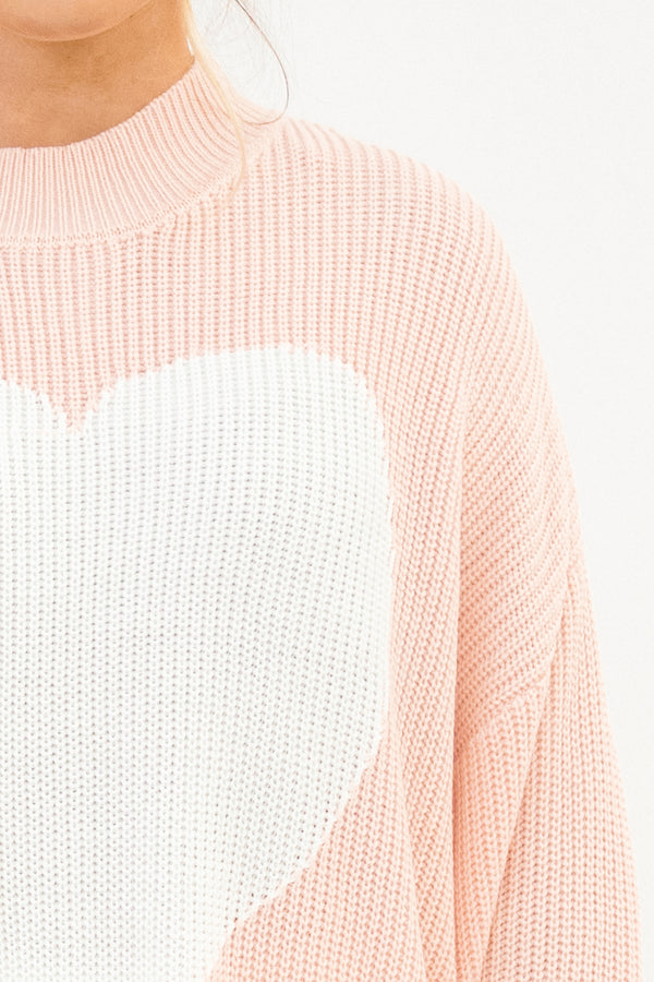 Chic Soul plus size clothing, pink long sleeve sweater with large white heart in the middle