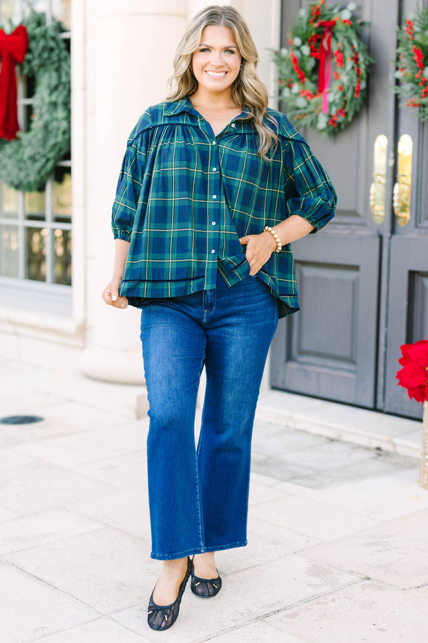 Plus size green plaid blouse with a flowy fit, button-down front, and classic collar.