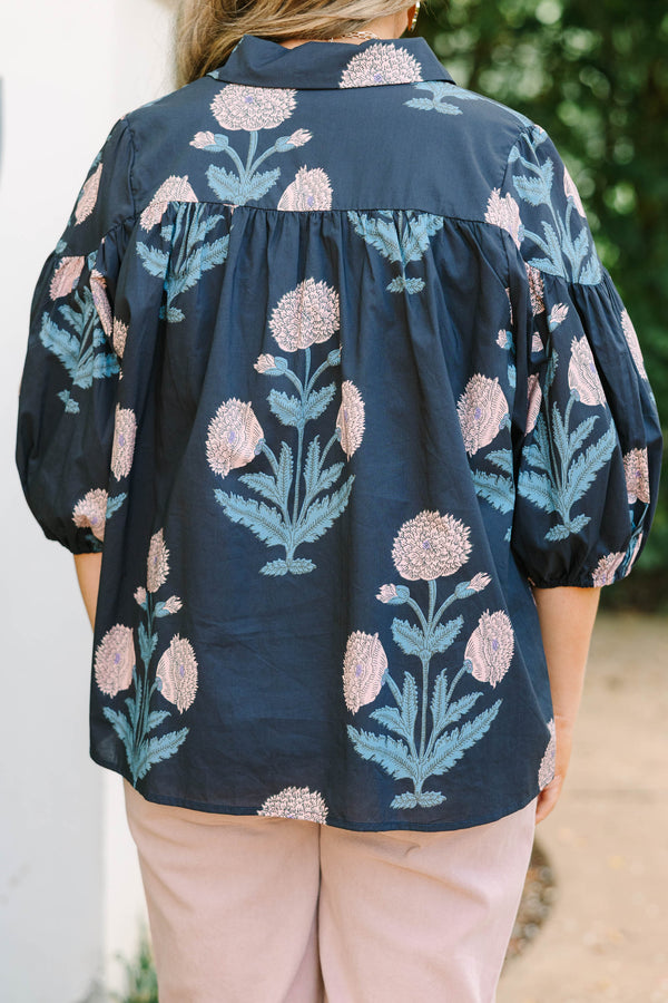 Plus Size navy floral button-up blouse with bubble sleeves and a collared neckline.