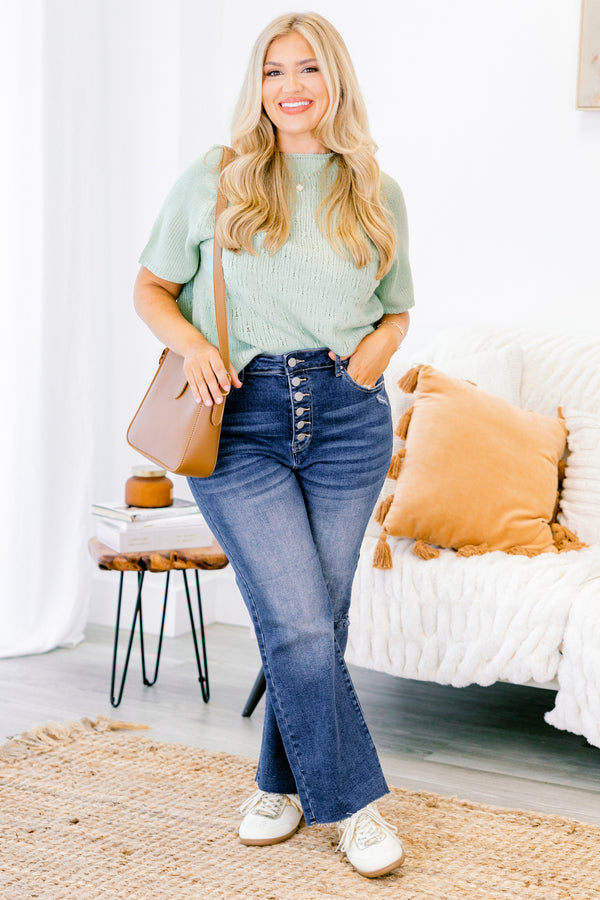 Chic Soul plus size clothing, Dark wash distressed jeans with a whole on the left knee and buttons instead of a zipper 