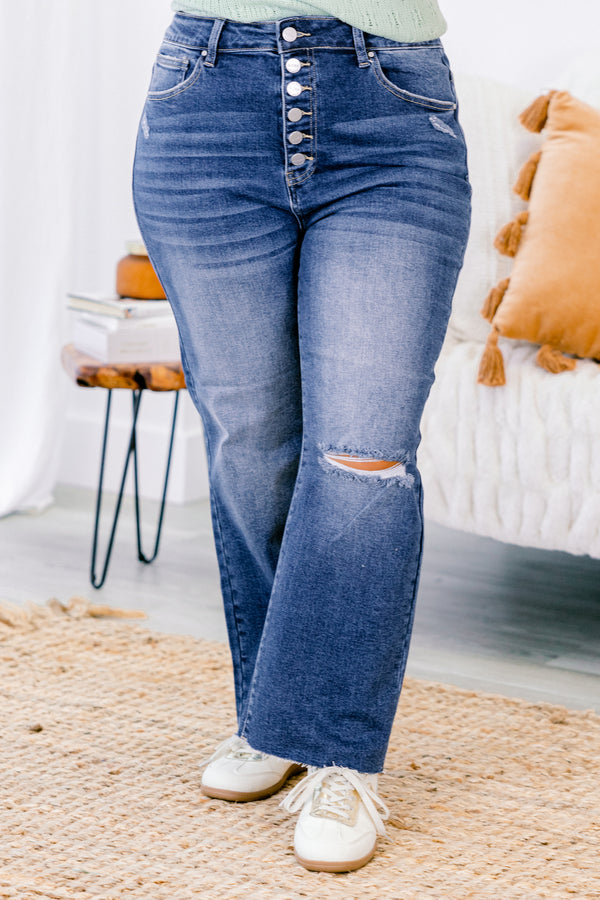 Chic Soul plus size clothing, Dark wash distressed jeans with a whole on the left knee and buttons instead of a zipper 
