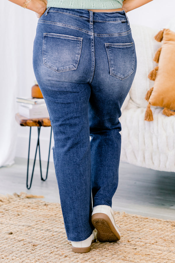 Chic Soul plus size clothing, Dark wash distressed jeans with a whole on the left knee and buttons instead of a zipper 