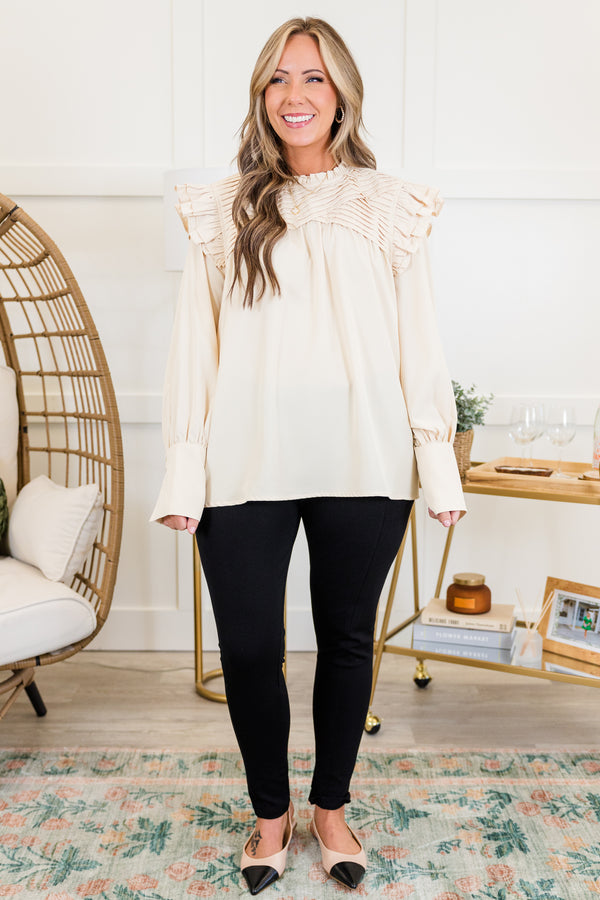 Chic Soul plus size clothing, cream long sleeve top with ribbed layered detail along chest with ruffle flare on shoulders with cuff sleeves