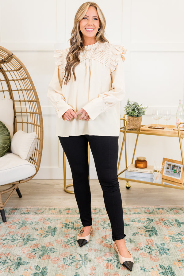 Chic Soul plus size clothing, cream long sleeve top with ribbed layered detail along chest with ruffle flare on shoulders with cuff sleeves