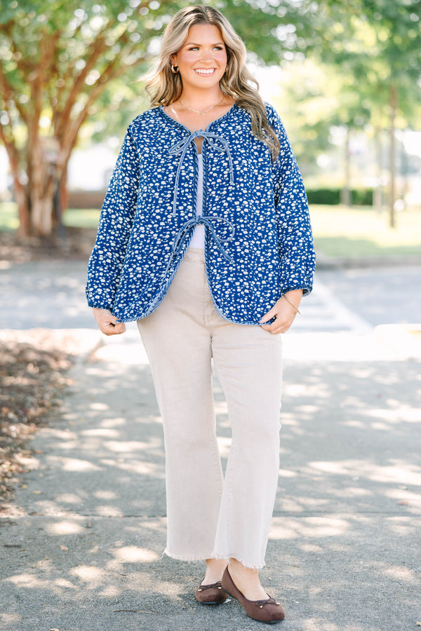 Plus Size quilted denim jacket with a diamond pattern, tie-front closures, and long sleeves.