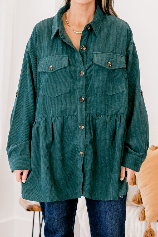 Chic Soul plus size clothing, dark green long sleeve ribbed material shacket that buttons up down the middle with brown buttons and buttons on the 2 front pockets and on the sleeves