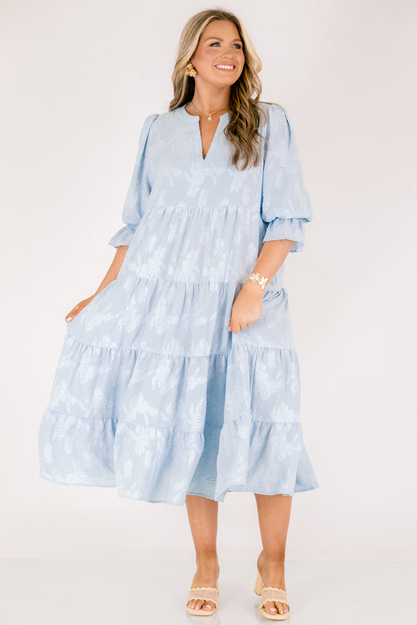 Chic Soul plus size clothing, baby blue tiered midi dress with half sleeves that that have a ruffle detail at the end of each sleeve as well a slight v-neckline and subtle floral pattern 