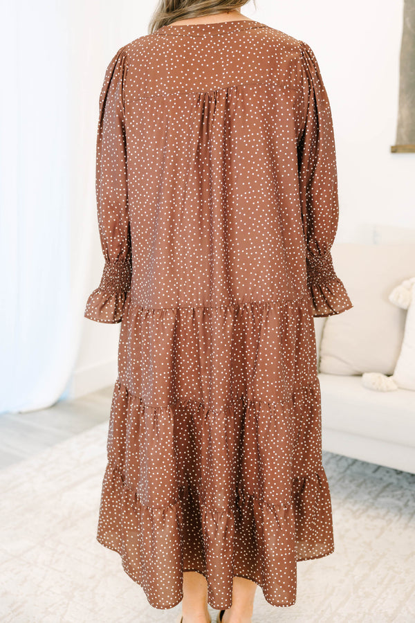 Plus Size brown polka dot tiered midi dress with a V-neckline and short puff sleeves.