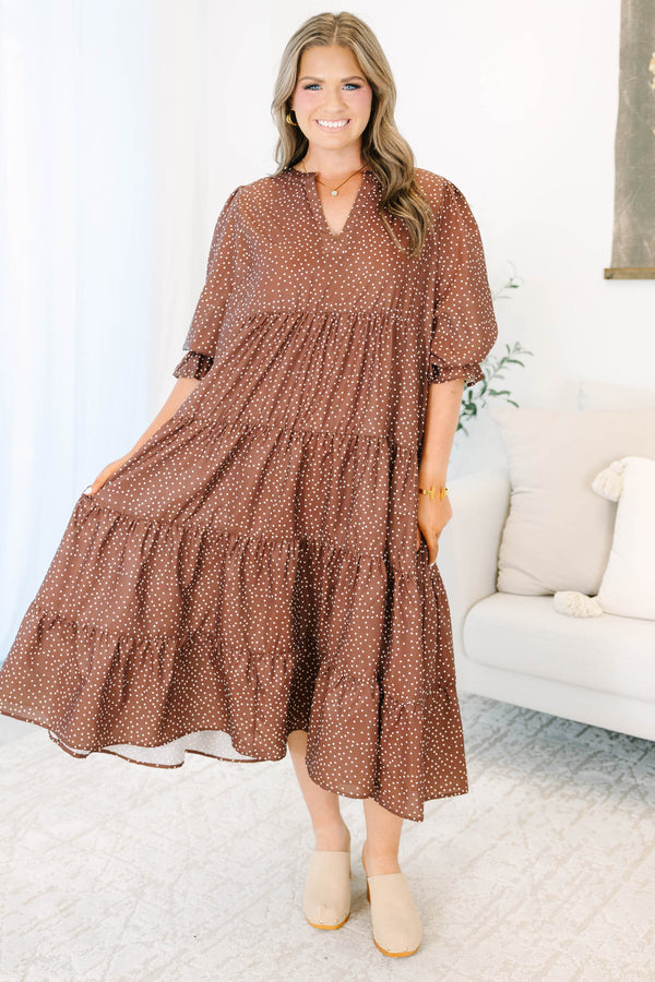 Plus Size brown polka dot tiered midi dress with a V-neckline and short puff sleeves.