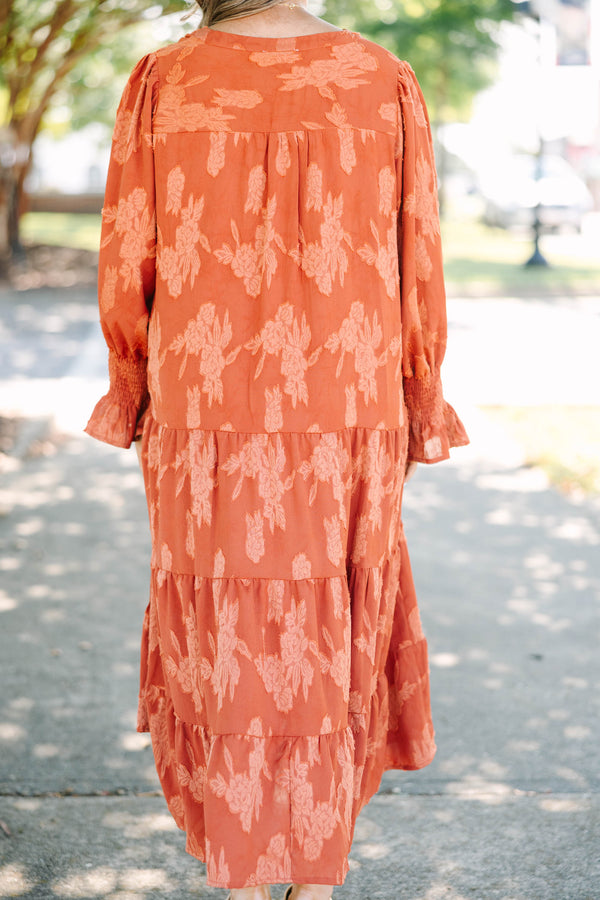 Plus Size orange tiered midi dress with a floral jacquard pattern, V-neckline, and 3/4 sleeves.
