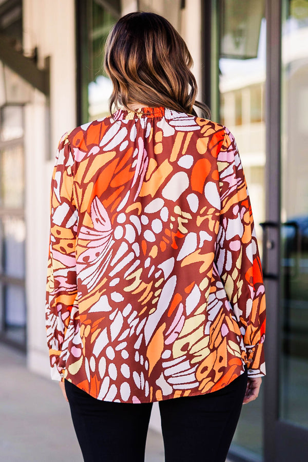 Chic Soul plus size clothing, rust multicolored abstract pattern long sleeve top with a high neckline