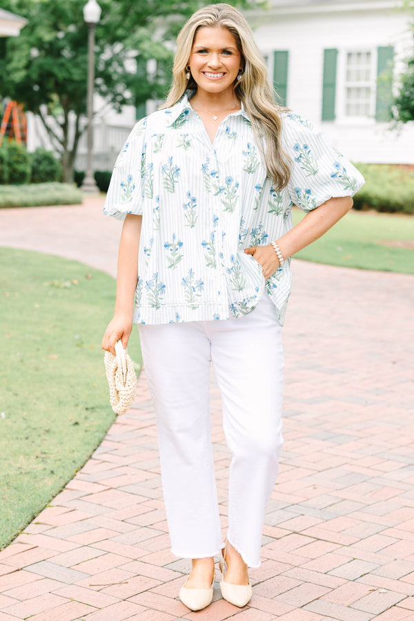 Plus Size blue and white striped button-down top with a floral print and puff sleeves.