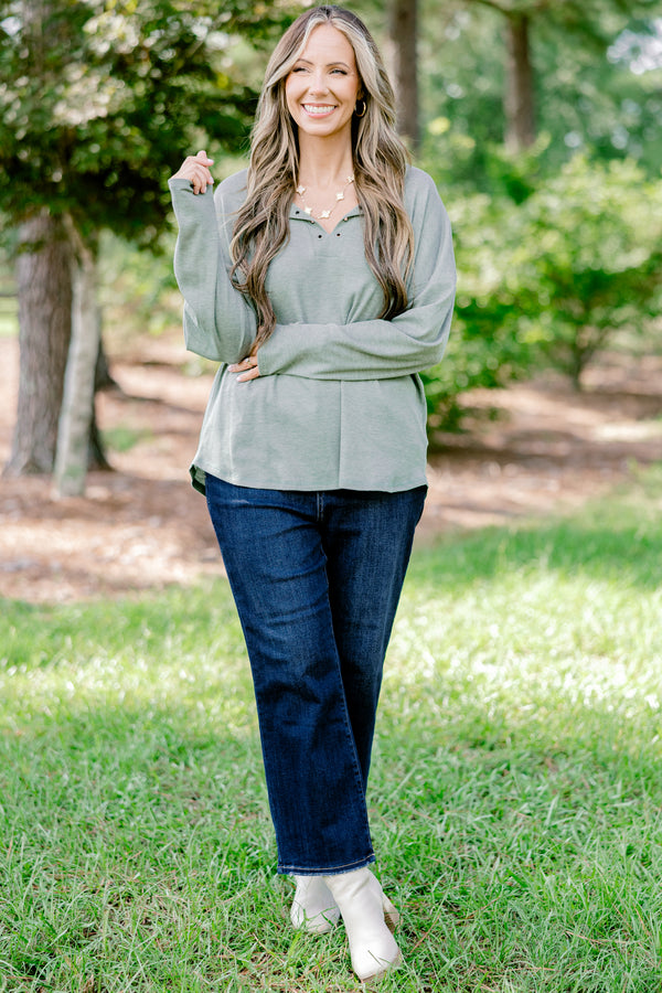 Chic Soul plus size clothing, light olive long sleeve top with scoop hem and buttons 1/4 of the way down the front