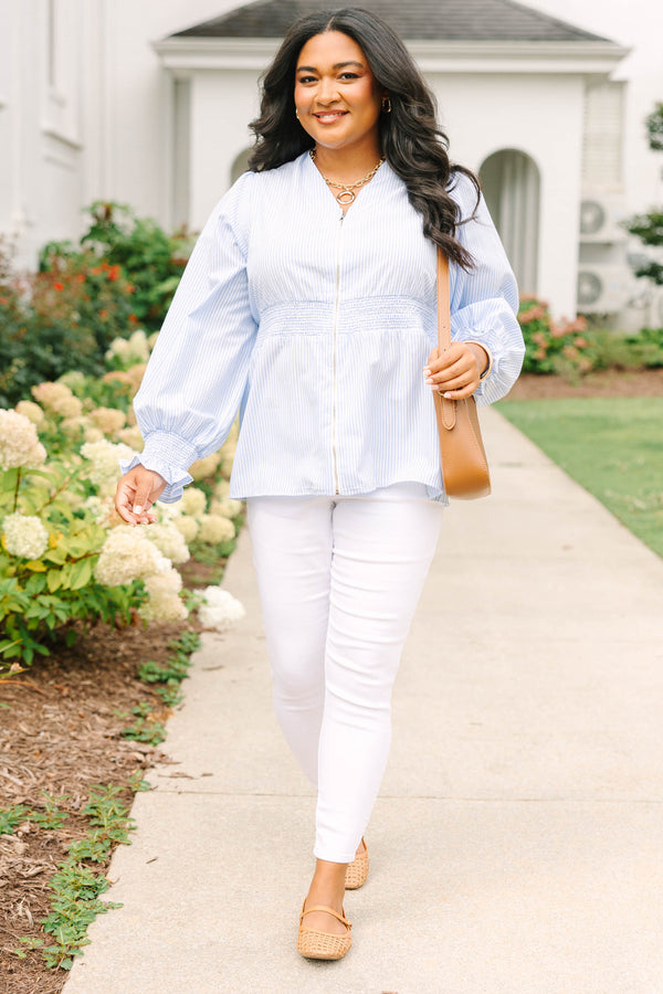 Plus Size light blue and white striped blouse with a zippered front and smocked waist.