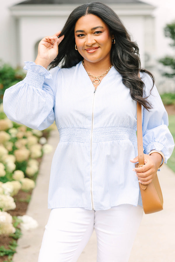 Plus Size light blue and white striped blouse with a zippered front and smocked waist.