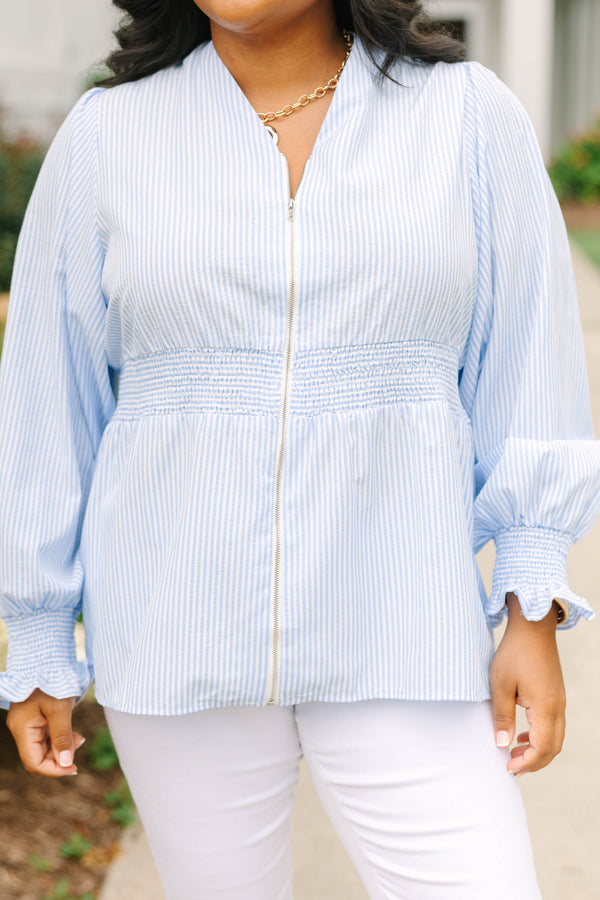 Plus Size light blue and white striped blouse with a zippered front and smocked waist.