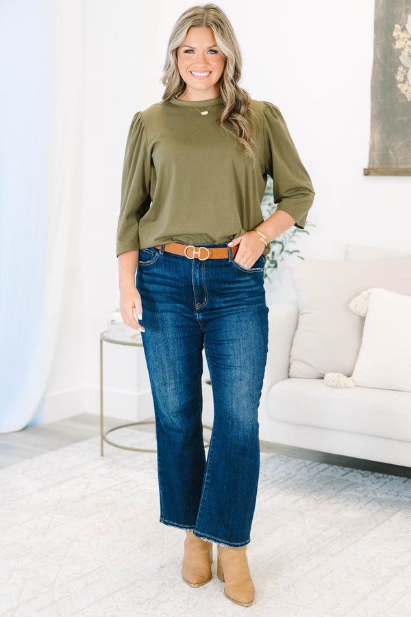 Plus size olive green top with puff sleeves and a relaxed fit