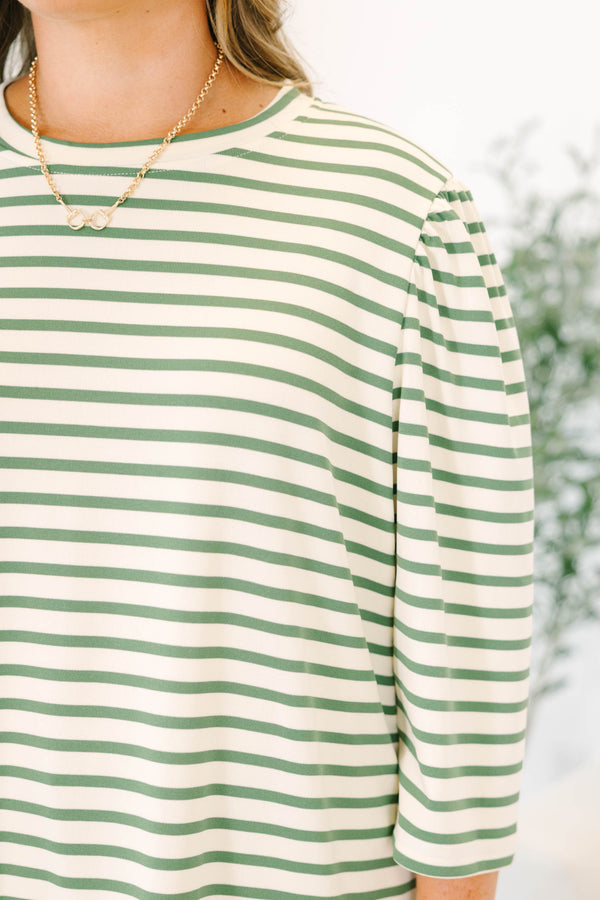 Plus Size olive and white striped crew neck top with puff sleeves and a relaxed fit.