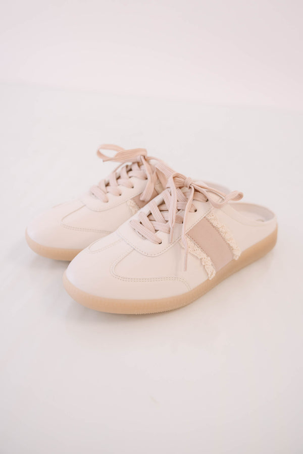 Plus Size pink backless mule sneakers with lace-up front, frayed trim, and tan rubber soles.