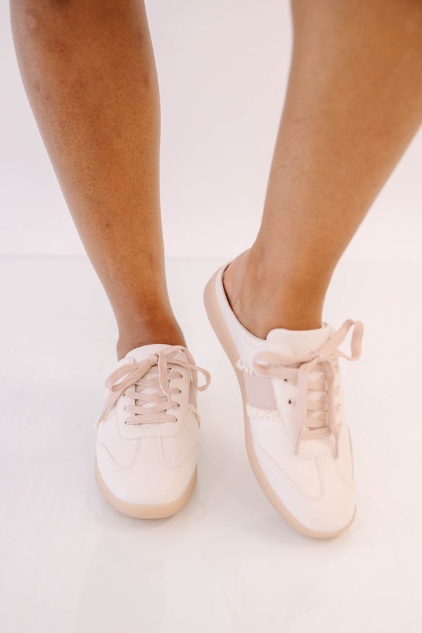 Plus Size pink backless mule sneakers with lace-up front, frayed trim, and tan rubber soles.