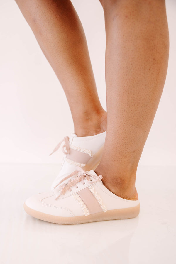 Plus Size pink backless mule sneakers with lace-up front, frayed trim, and tan rubber soles.